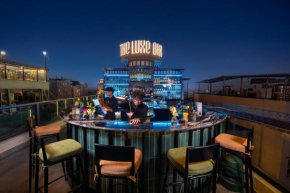 Le Premier Hotel & Rooftop Bar